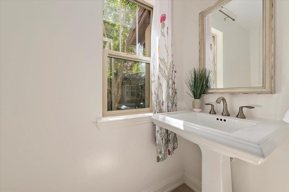 3003 Marcelli Circle Los Altos, CA 94022 - Photo 9 of 21 a bathroom with a sink and a mirror
