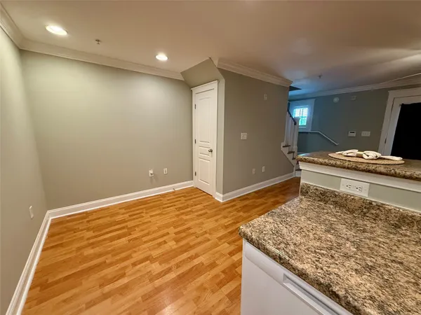 a bedroom with a bed and a sink