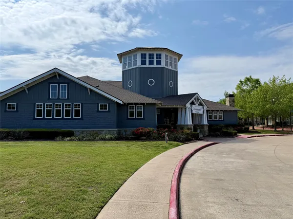 a house with trees in the background