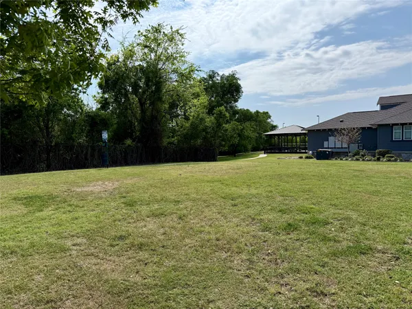 a living room with fireplace furniture and a flat screen tv