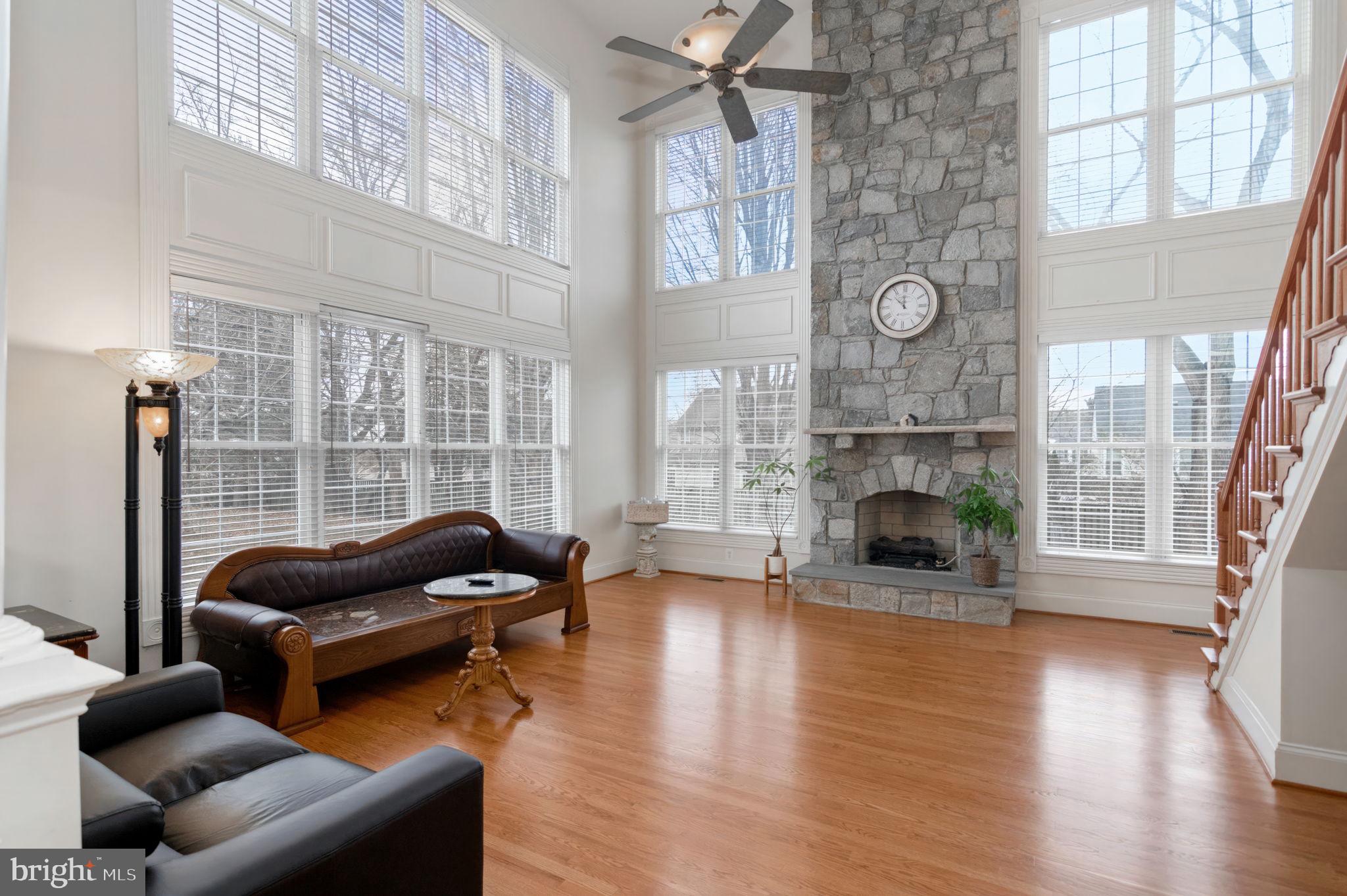 11375 Harding Road Laurel, MD 20723 - Photo 15 of 40 a living room with furniture and a fireplace
