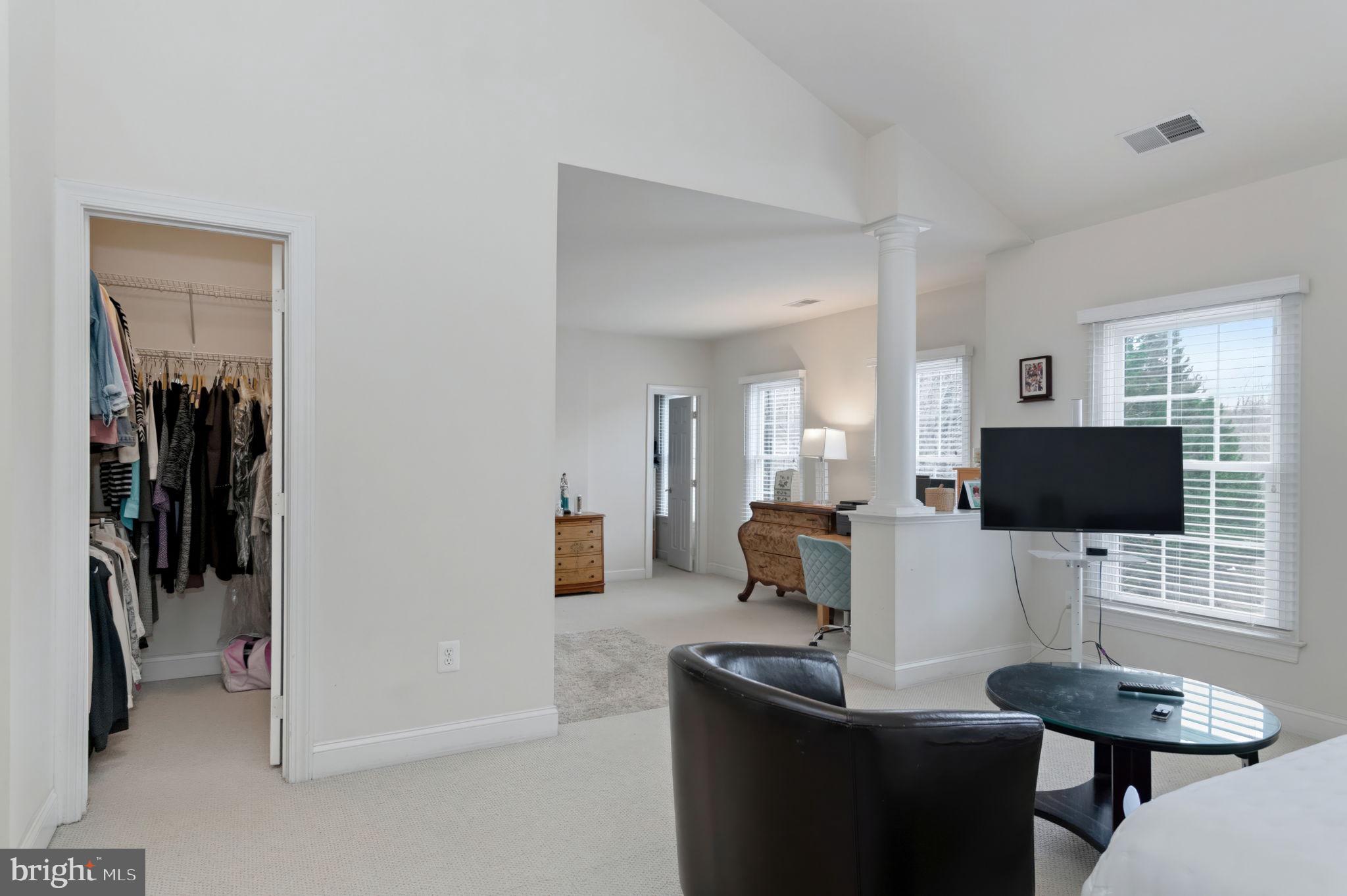 11375 Harding Road Laurel, MD 20723 - Photo 20 of 40 a living room with furniture and a flat screen tv