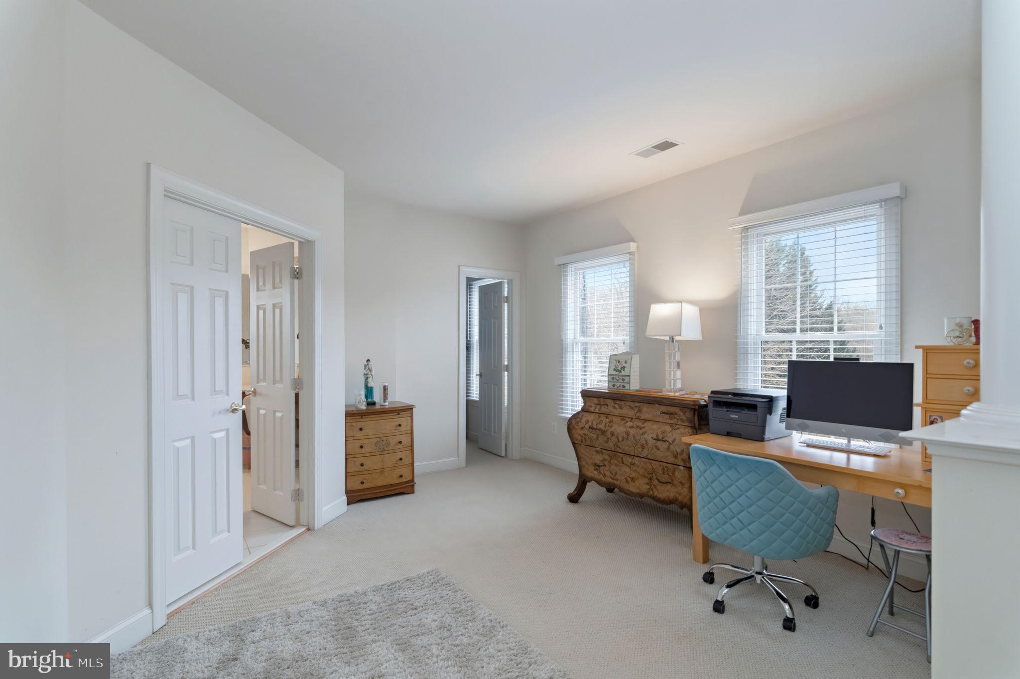 11375 Harding Road Laurel, MD 20723 - Photo 21 of 40 a living room with furniture and a window