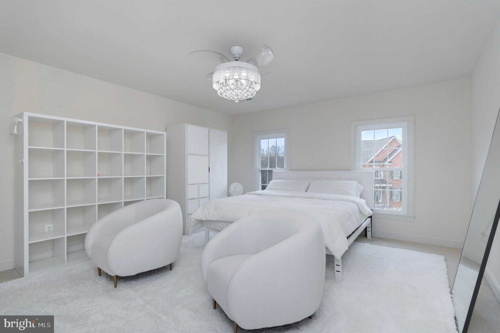 11375 Harding Road Laurel, MD 20723 - Photo 24 of 40 a bedroom with a bed and a window