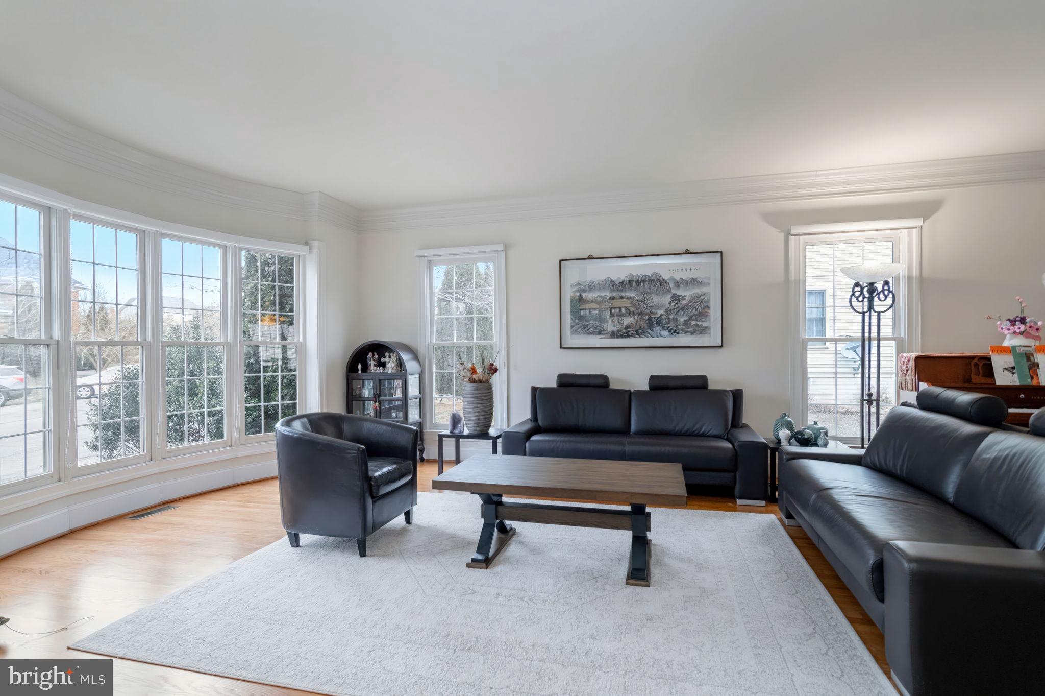 11375 Harding Road Laurel, MD 20723 - Photo 5 of 40 a living room with furniture and a large window