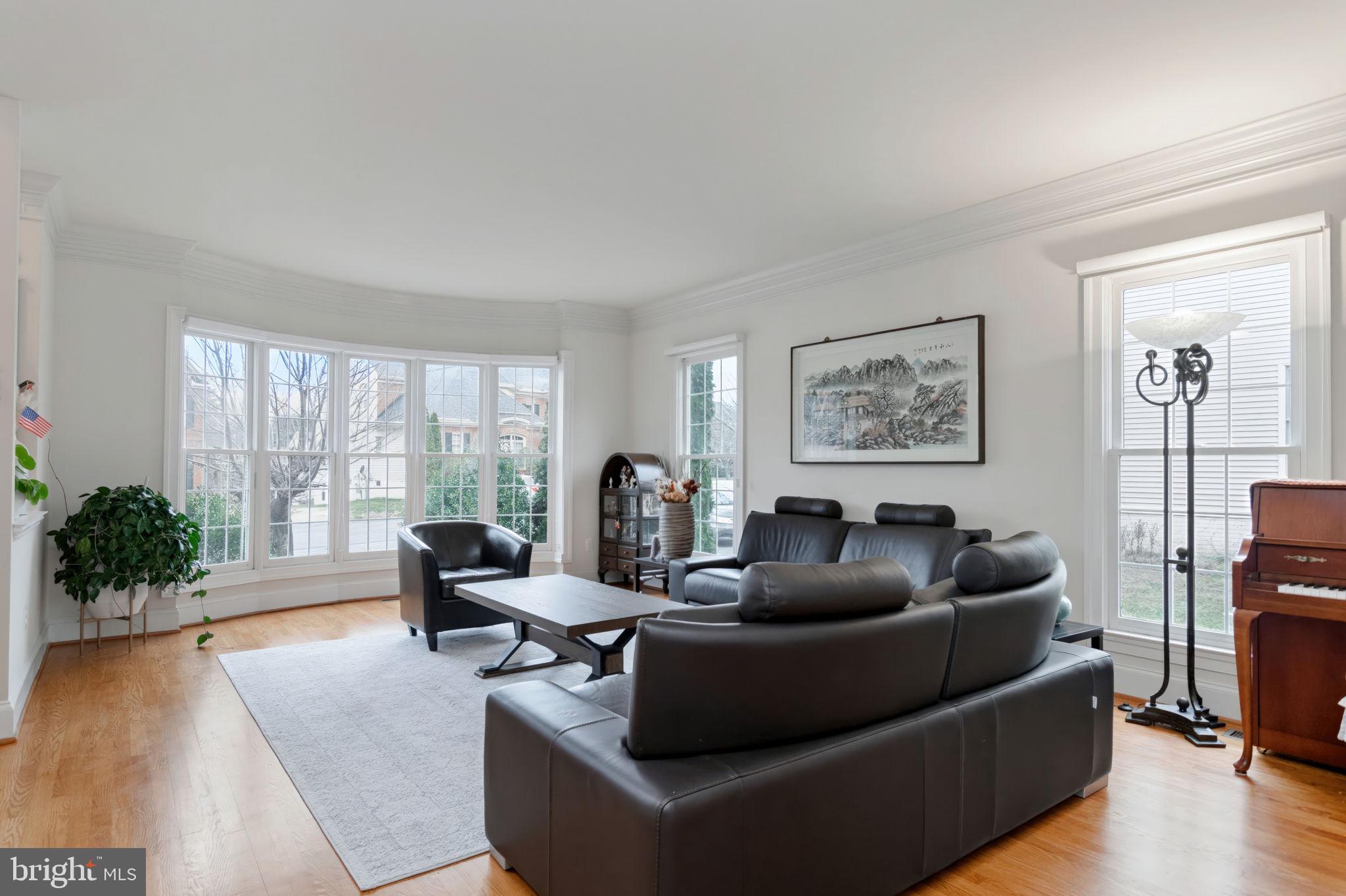 11375 Harding Road Laurel, MD 20723 - Photo 6 of 40 a living room with furniture and a large window