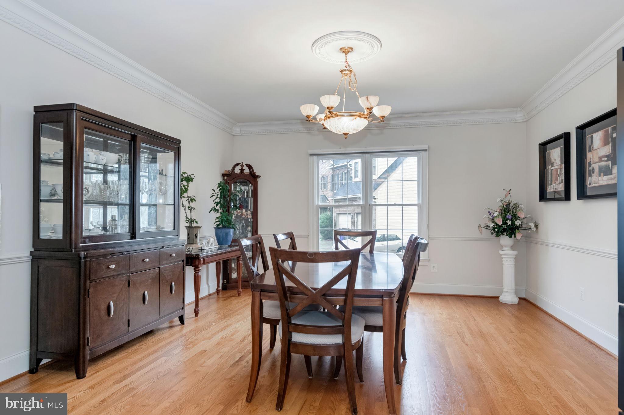 11375 Harding Road Laurel, MD 20723 - Photo 7 of 40 a view of a dining room with furniture window and wooden floor
