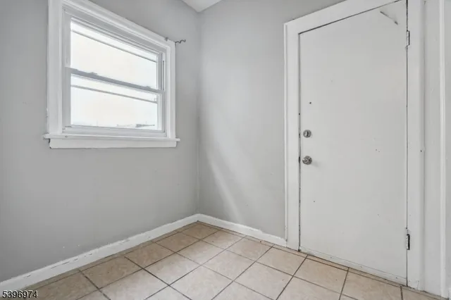 a view of an empty room with window