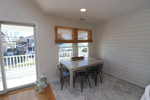 a workspace with furniture and a window