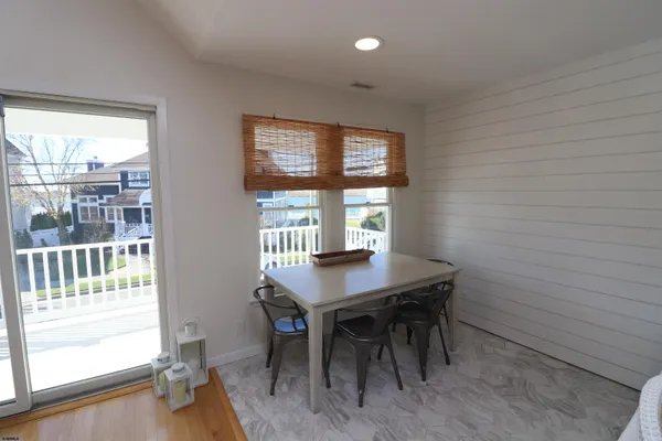 a workspace with furniture and a window