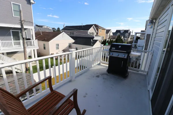 a view of a terrace with chairs