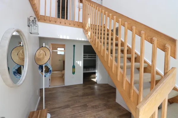 a view of entryway with wooden floor