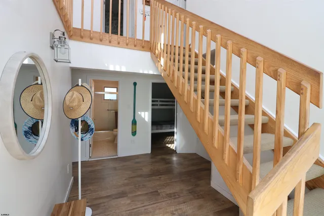 a view of entryway with wooden floor