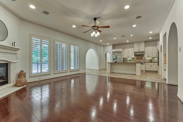 a view of dining room with furniture and a large window