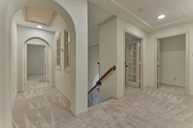 wooden floor with white walls