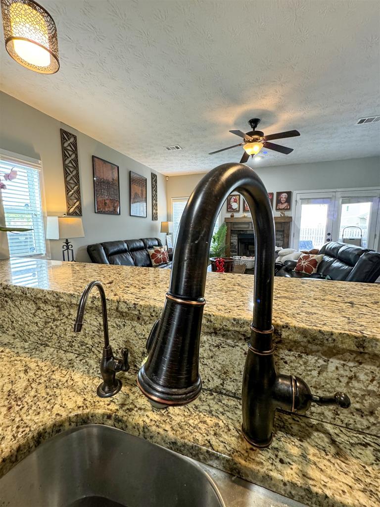 7263 Double Pine Drive Midland, GA 31820 - Photo 14 of 44 a front view of a house with garden