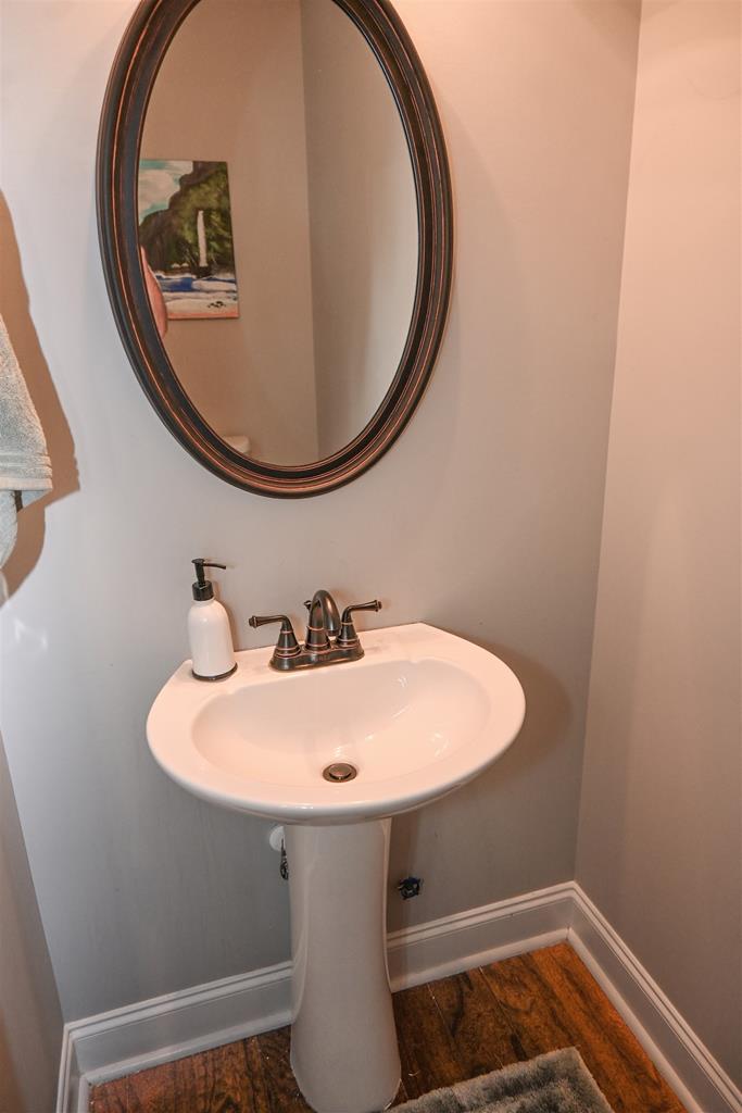 7263 Double Pine Drive Midland, GA 31820 - Photo 21 of 44 a bathroom with a sink and a mirror