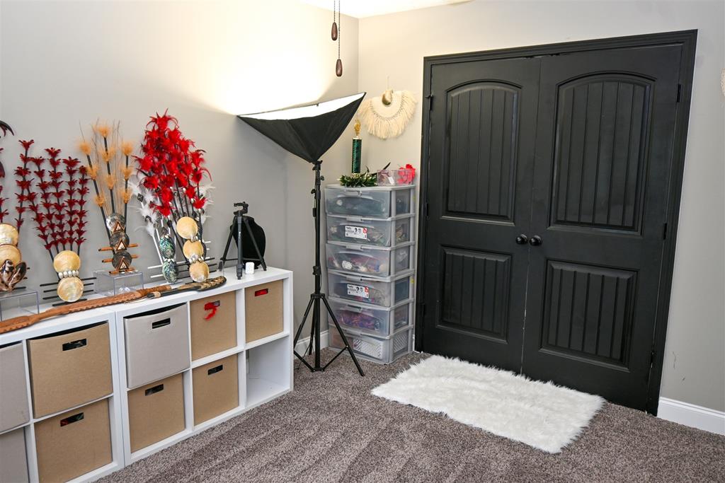 7263 Double Pine Drive Midland, GA 31820 - Photo 35 of 44 a kitchen with a refrigerator and cabinets