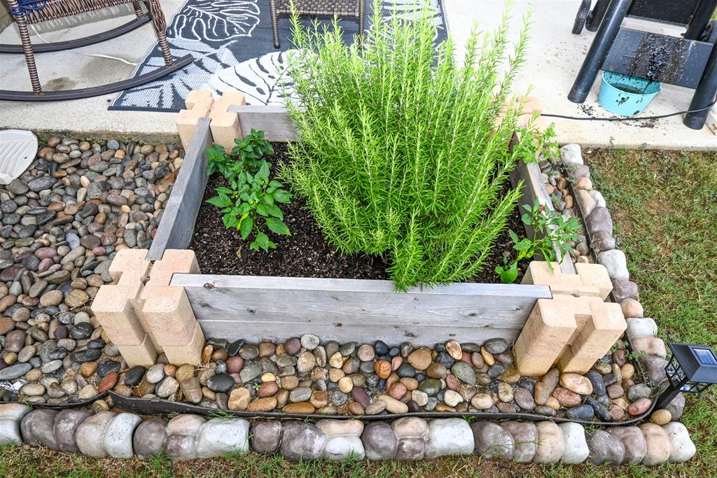 7263 Double Pine Drive Midland, GA 31820 - Photo 7 of 44 a wooden bench sitting in front of a building