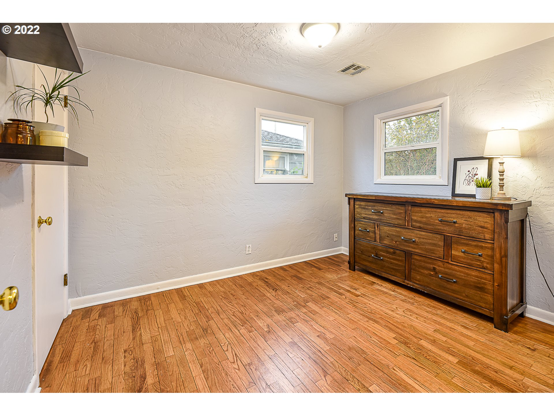 3241 Pheasant Boulevard Springfield, OR 97477 - Photo 22 of 28 a view of an empty room with window and cabinet
