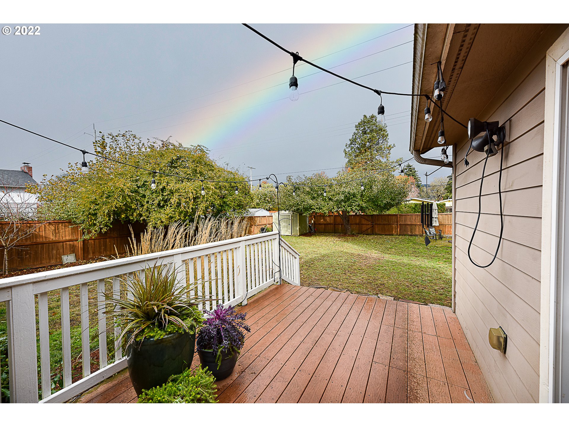 3241 Pheasant Boulevard Springfield, OR 97477 - Photo 23 of 28 a view of a yard with wooden floor