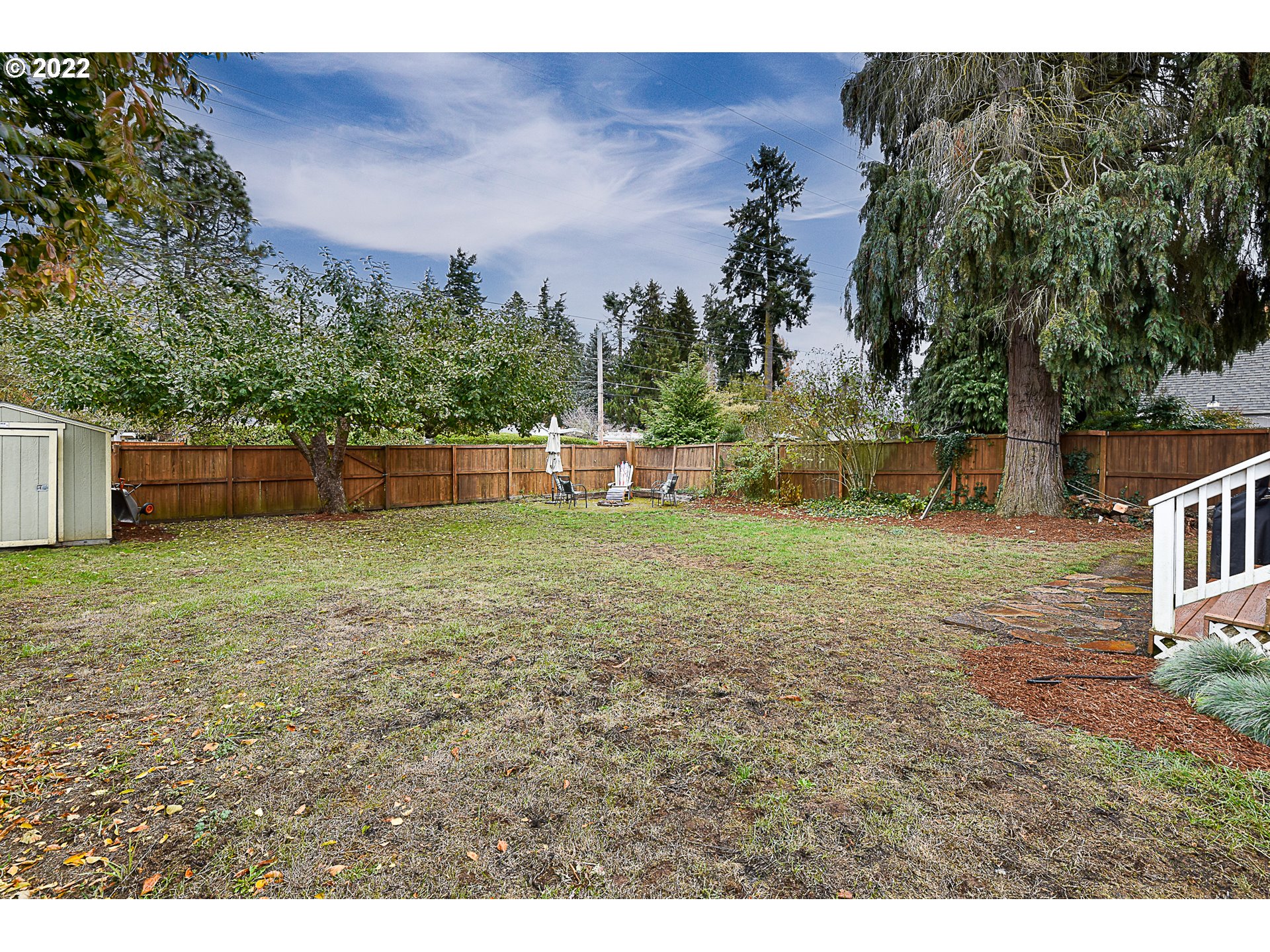 3241 Pheasant Boulevard Springfield, OR 97477 - Photo 24 of 28 a backyard of a house with lots of green space