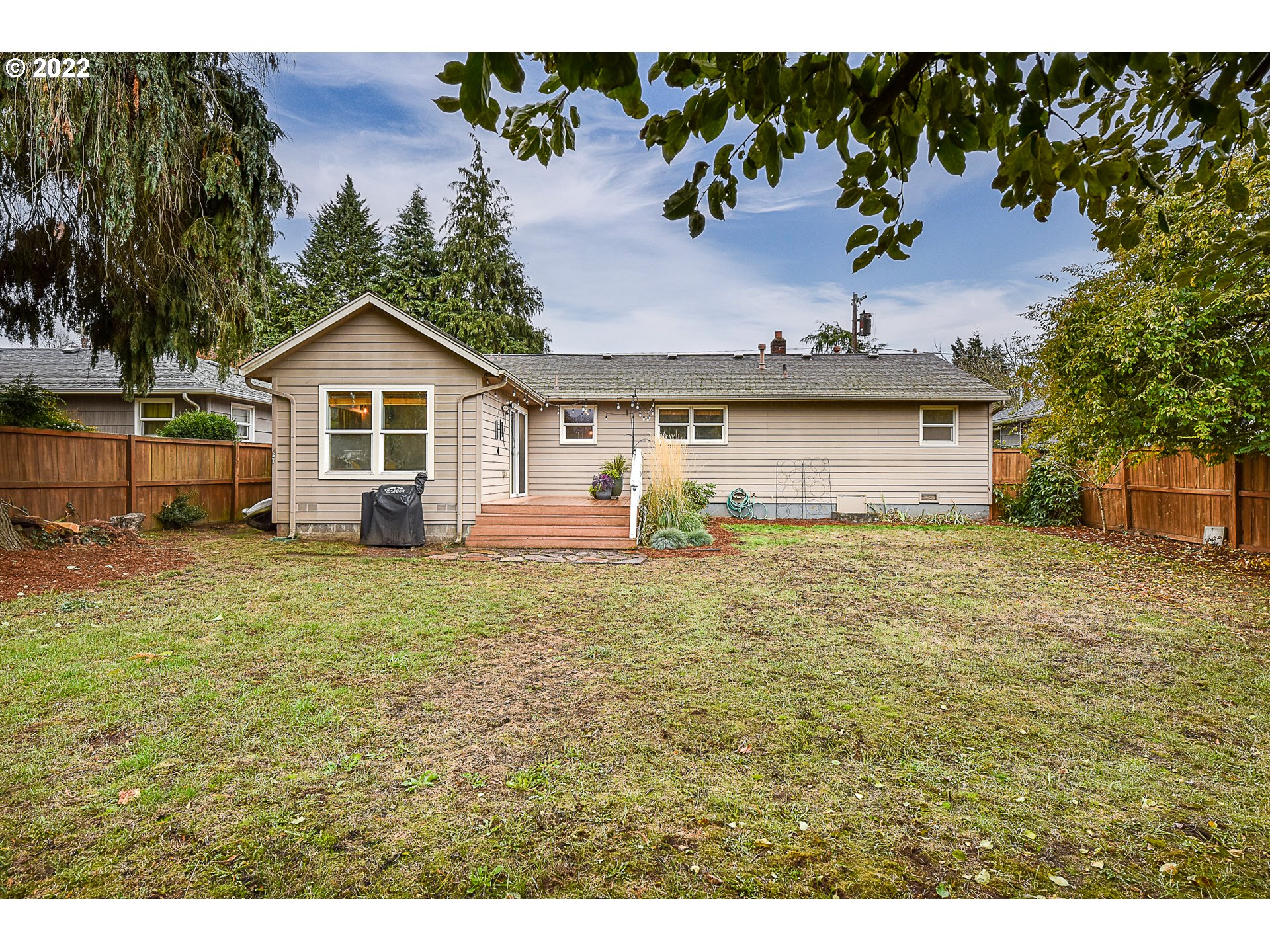3241 Pheasant Boulevard Springfield, OR 97477 - Photo 25 of 28 a view of a house with a backyard