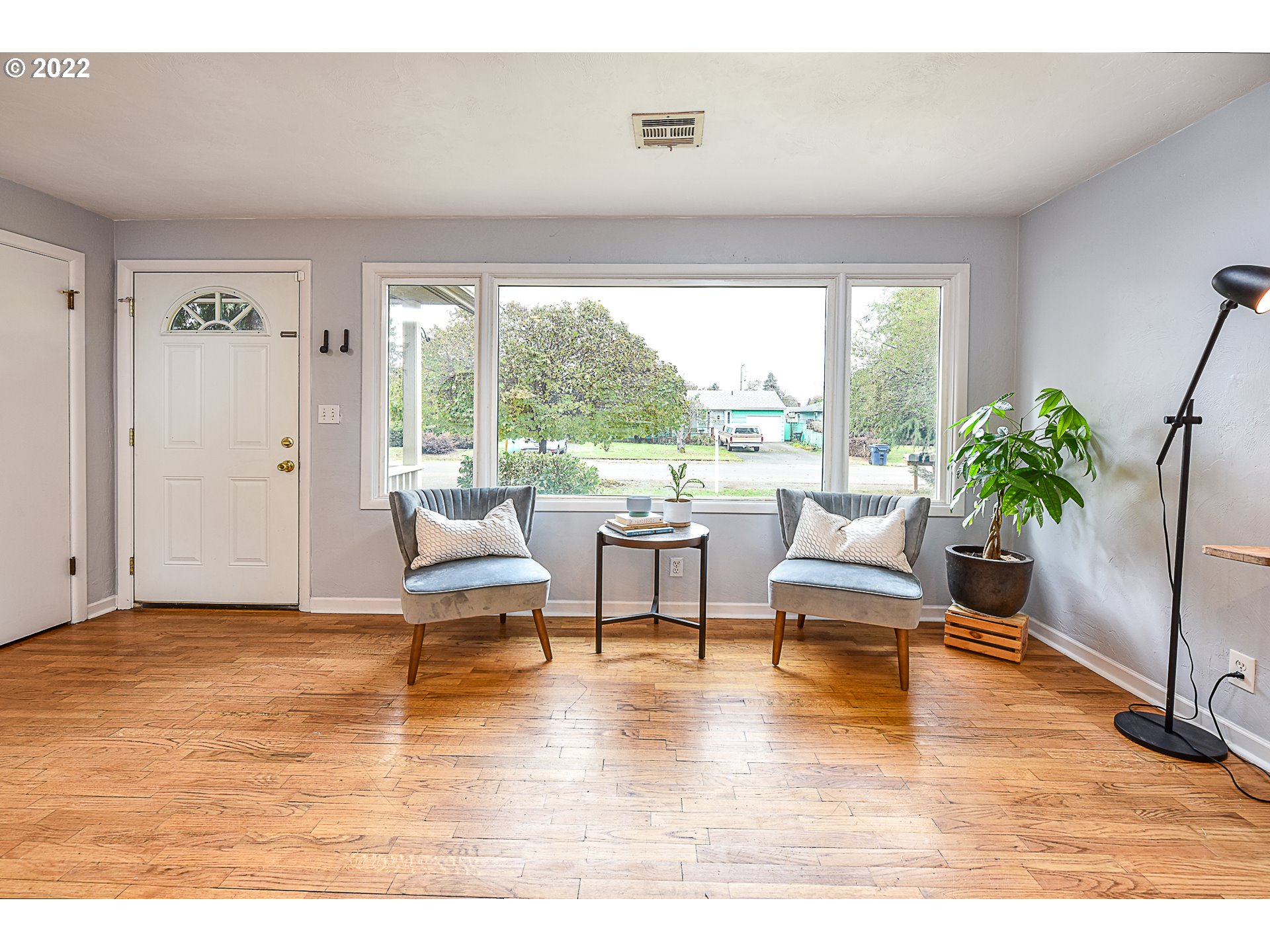 3241 Pheasant Boulevard Springfield, OR 97477 - Photo 5 of 28 a living room with furniture and a large window