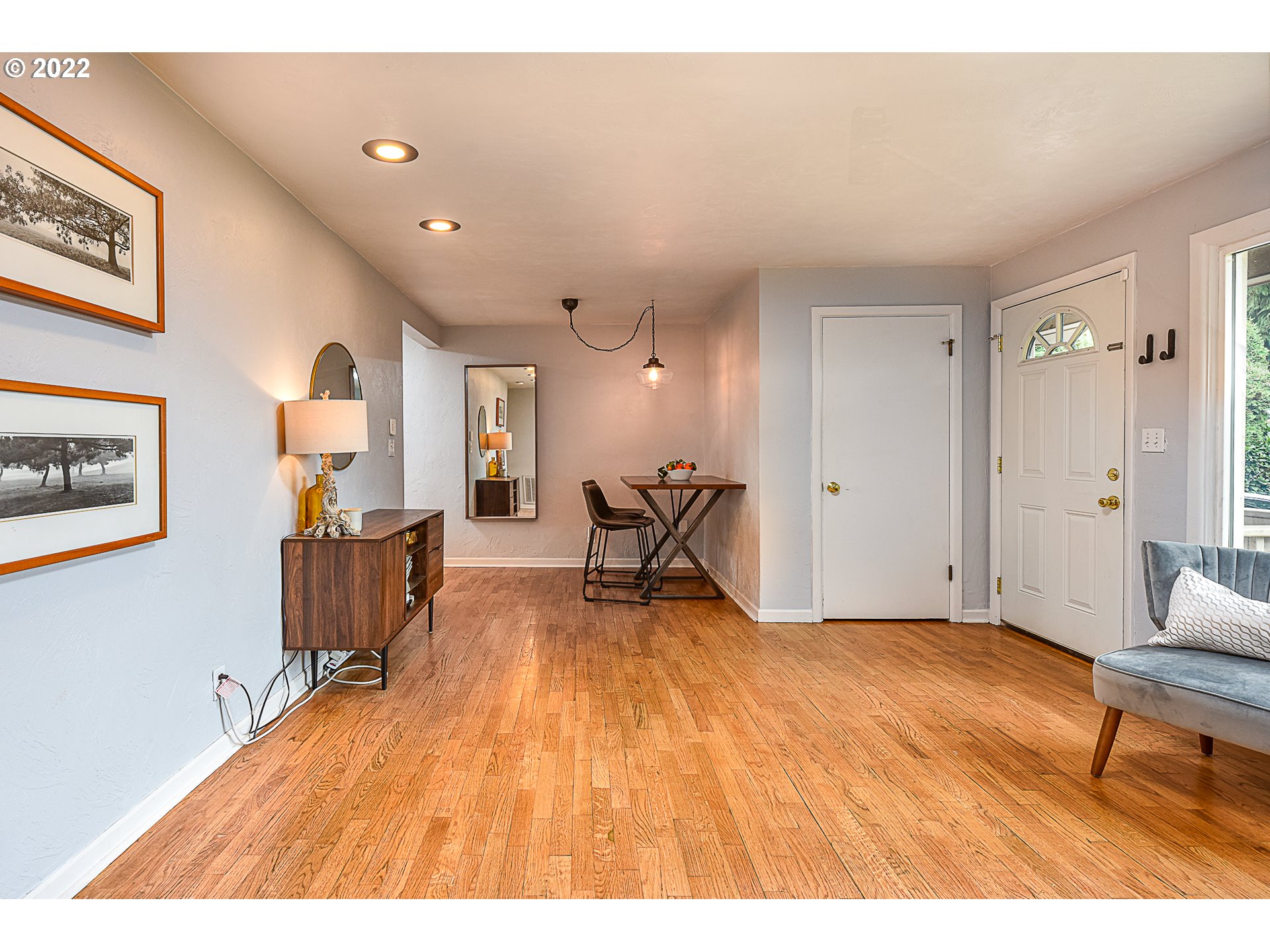 3241 Pheasant Boulevard Springfield, OR 97477 - Photo 6 of 28 a living room with furniture and a wooden floor