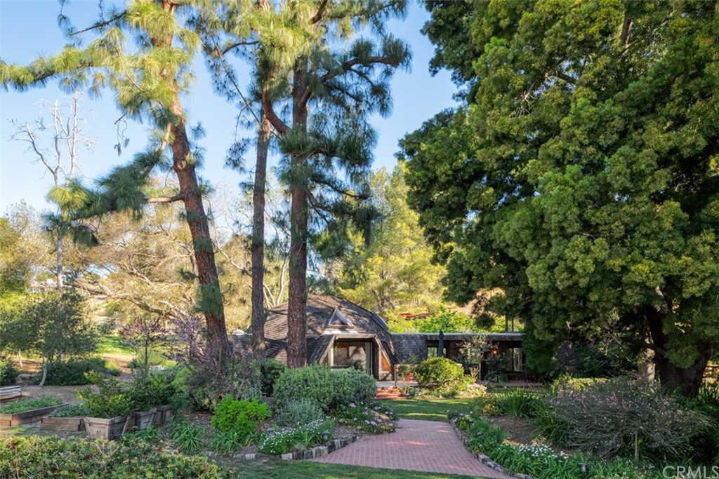 an aerial view of house with yard