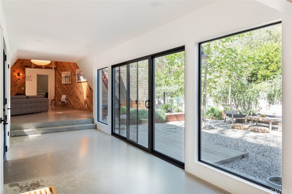 4935 San Jacinto Circle East Fallbrook, CA 92028 - Photo 16 of 53 a view of a porch with a floor to ceiling window