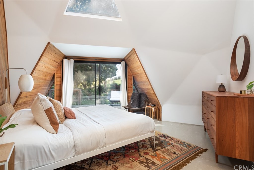 4935 San Jacinto Circle East Fallbrook, CA 92028 - Photo 18 of 53 a bedroom with a bed and wooden floor