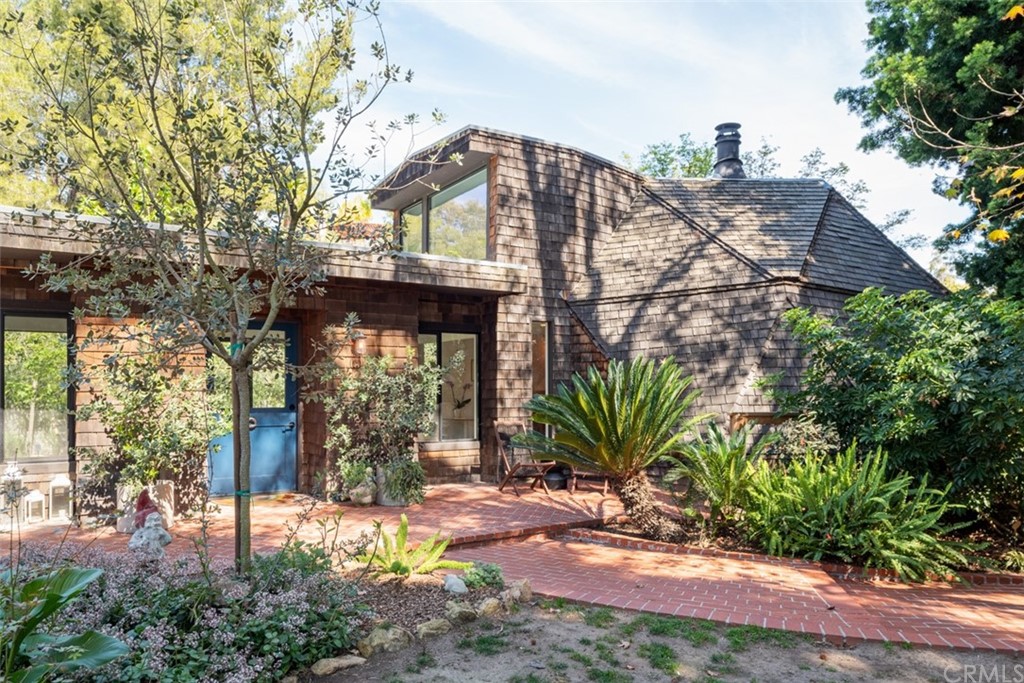 4935 San Jacinto Circle East Fallbrook, CA 92028 - Photo 3 of 53 a view of a house with a tree in front of it