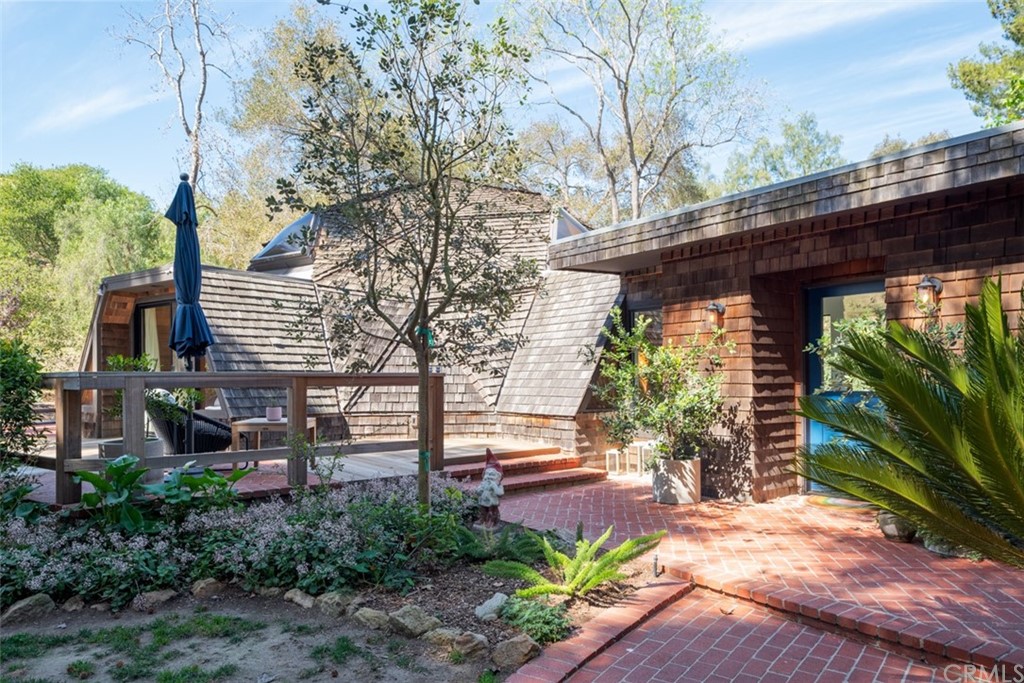 4935 San Jacinto Circle East Fallbrook, CA 92028 - Photo 33 of 53 a view of backyard with plants and outdoor seating