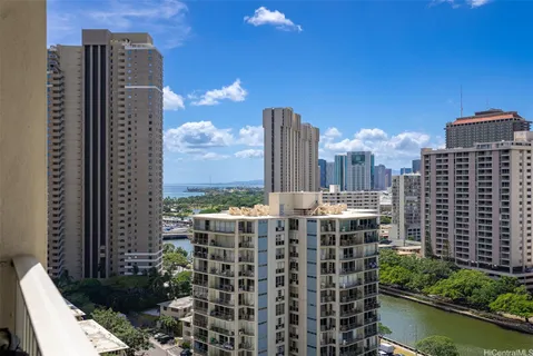 a view of a city with tall buildings