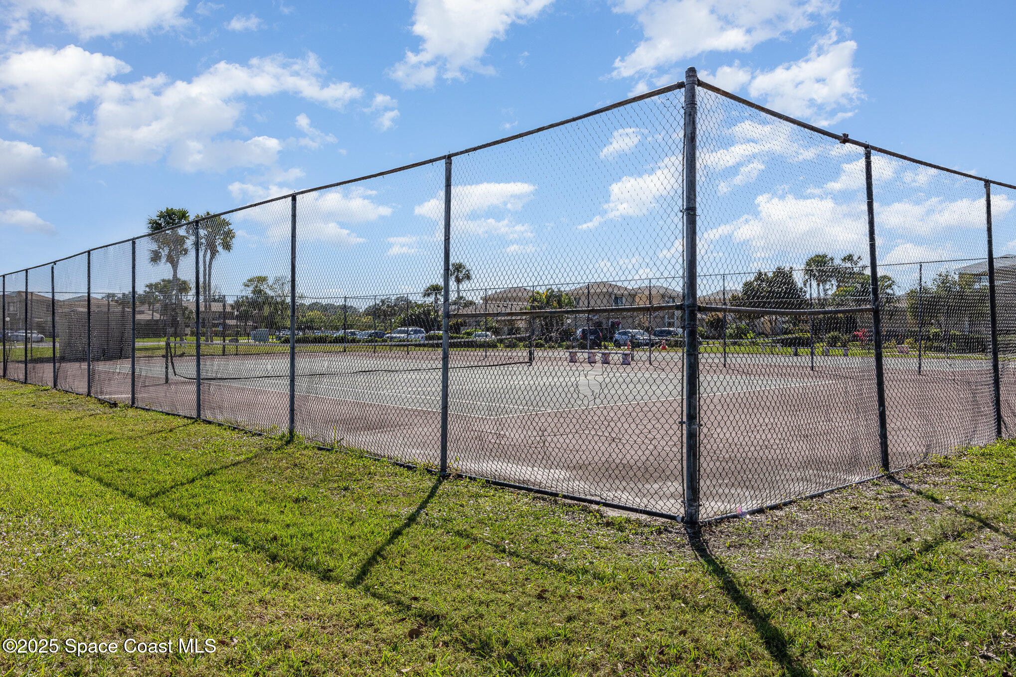1040 Abada Court Northeast, Unit 109 Palm Bay, FL 32905 - Photo 23 of 25 a view of a garden