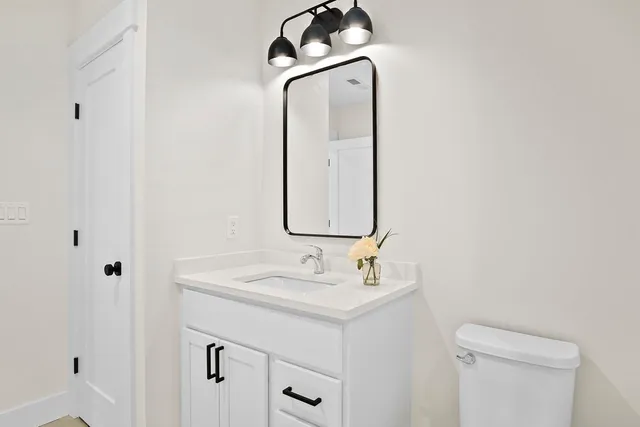 a view of a workspace with furniture