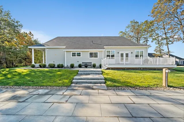 a view of swimming pool with lounge chair