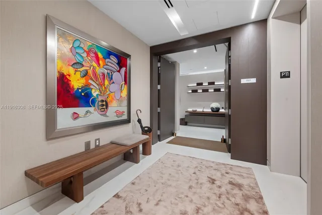 a bedroom with furniture and a painting on the wall