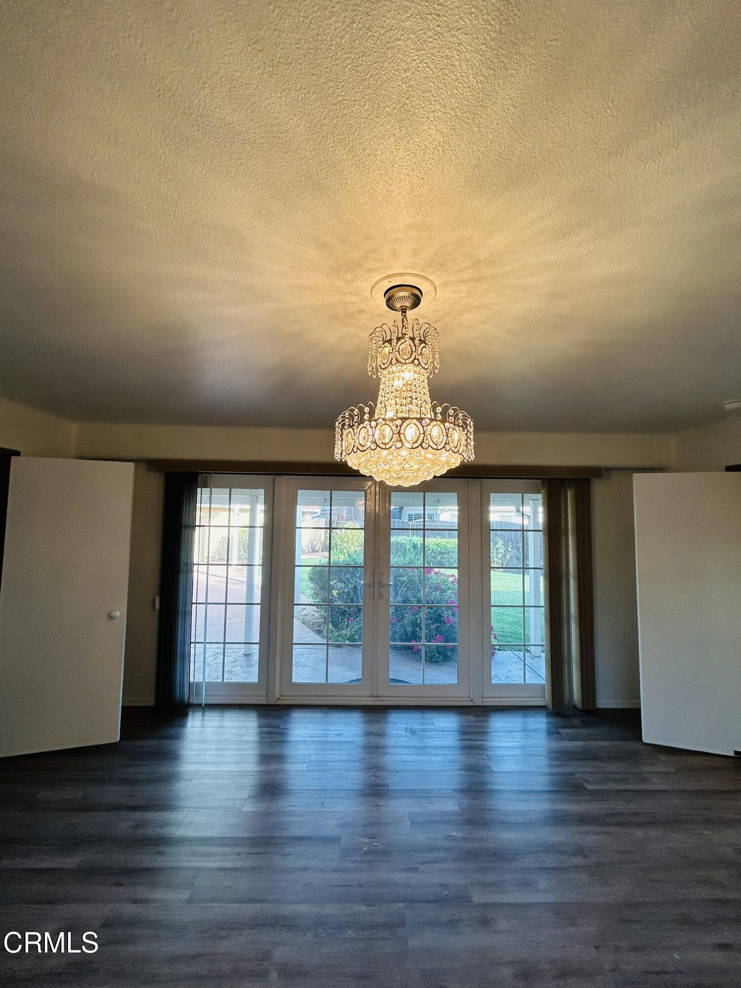 9630 Santa Rosa Road Camarillo, CA 93012 - Photo 11 of 35 a view of a livingroom with wooden floor and a large window
