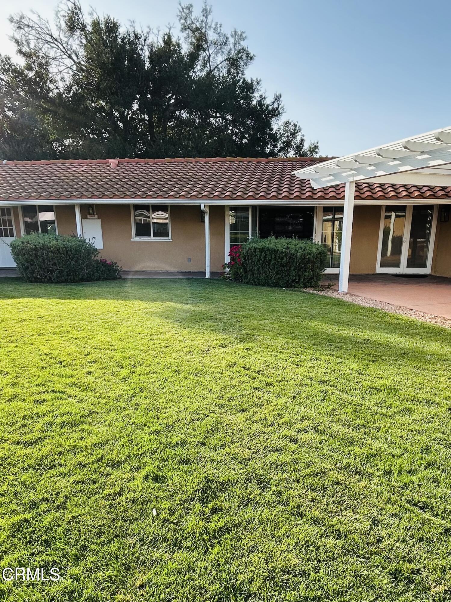 9630 Santa Rosa Road Camarillo, CA 93012 - Photo 20 of 35 a front view of a house with a yard