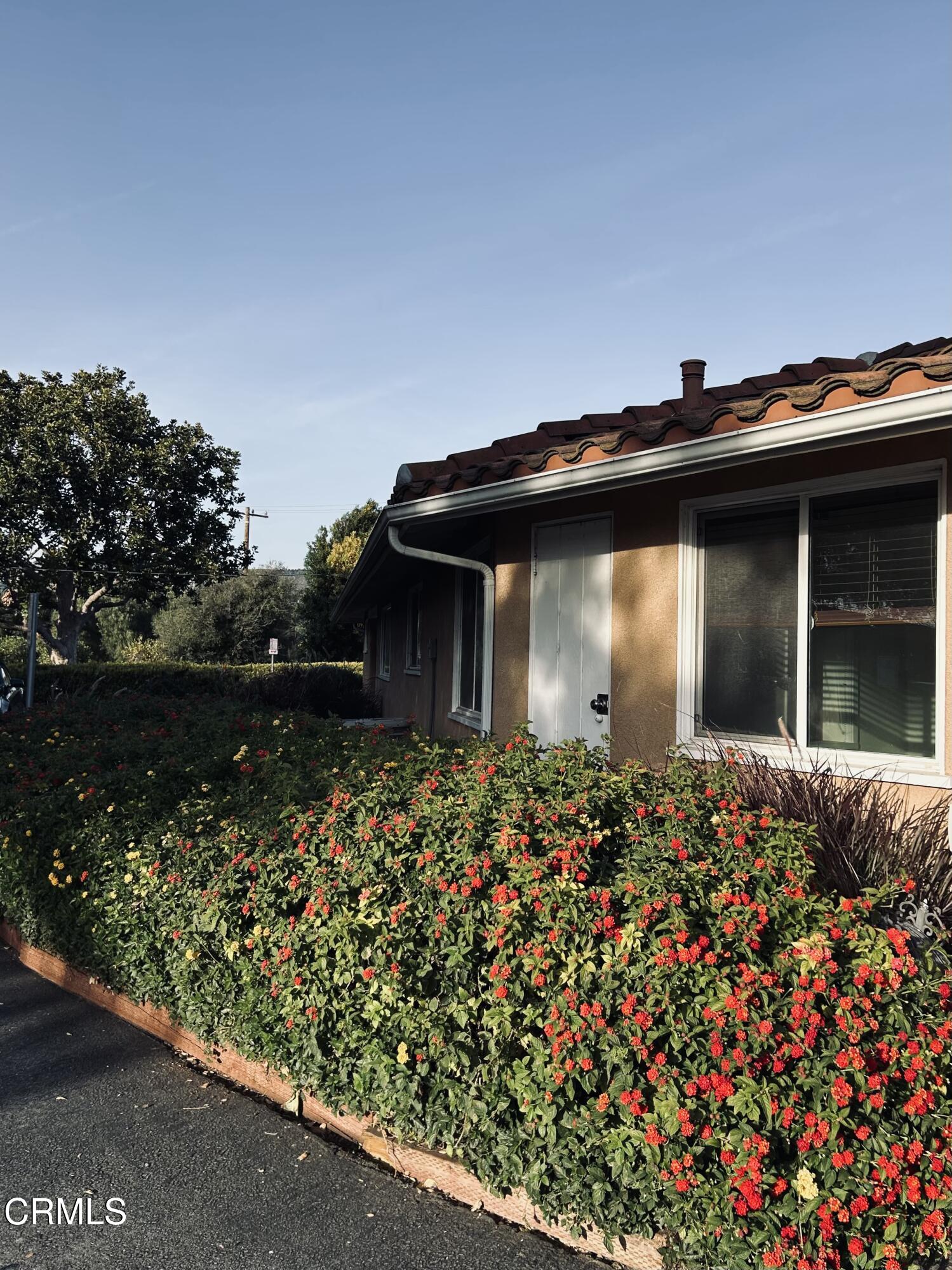 9630 Santa Rosa Road Camarillo, CA 93012 - Photo 2 of 35 a front view of a house with garden