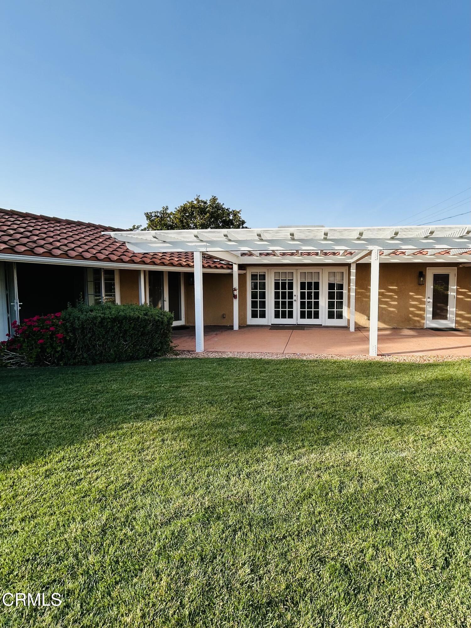 9630 Santa Rosa Road Camarillo, CA 93012 - Photo 21 of 35 a view of a house with a garden and yard