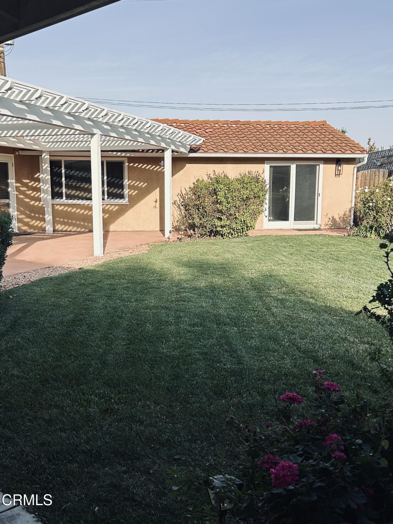9630 Santa Rosa Road Camarillo, CA 93012 - Photo 22 of 35 a front view of a house with a garden