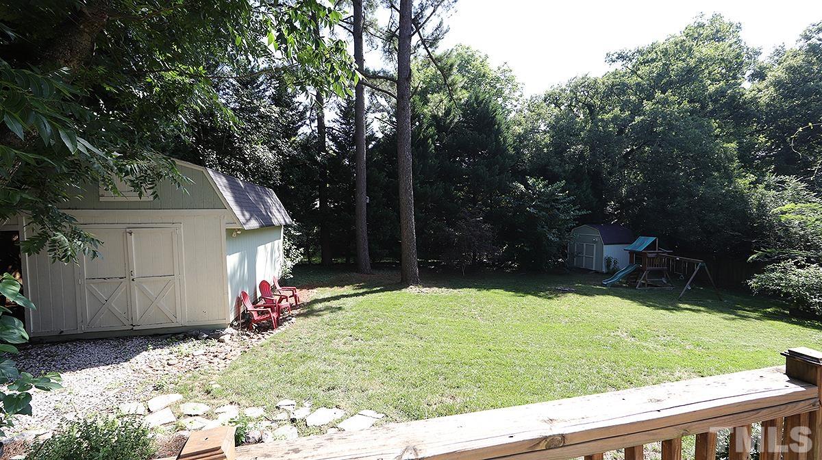 3016 Old Orchard Road Raleigh, NC 27607 - Photo 25 of 39 a view of a backyard with a garden