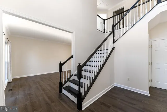 a view of entryway with wooden floor