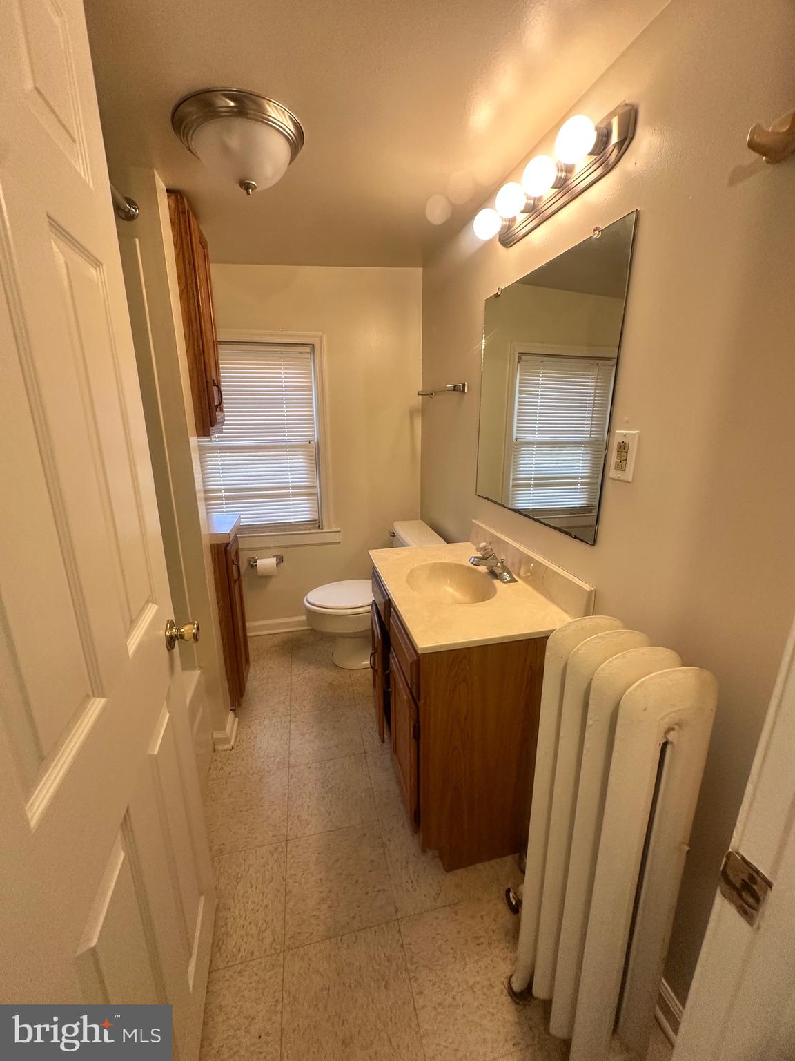 71 Sproul Road, Unit 3 Malvern, PA 19355 - Photo 11 of 11 a bathroom with a tub sink and mirror