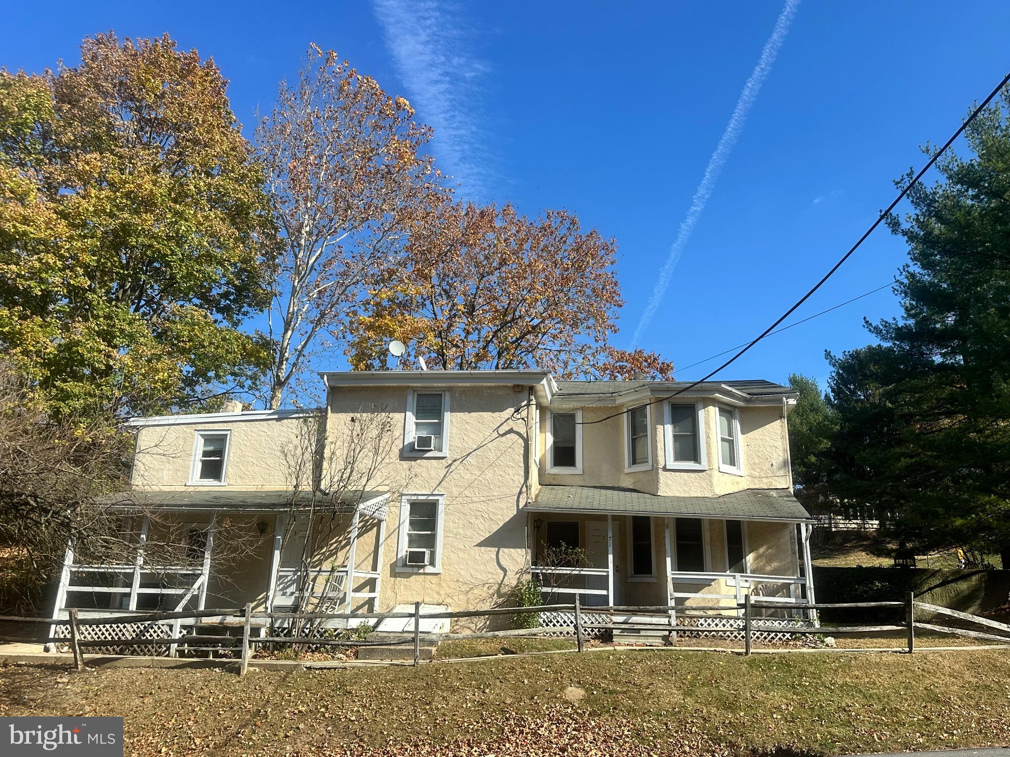 71 Sproul Road, Unit 3 Malvern, PA 19355 - Photo 2 of 11 a front view of a house with street