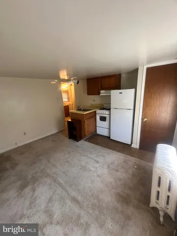 a storage room with washer and dryer