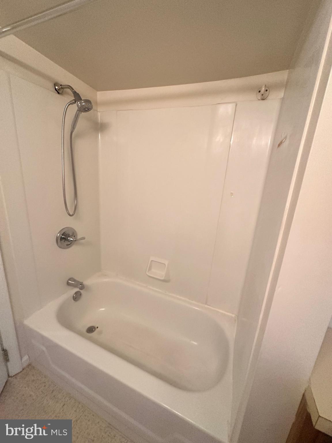 71 Sproul Road, Unit 3 Malvern, PA 19355 - Photo 6 of 11 a bathroom with a shower and a bath tub